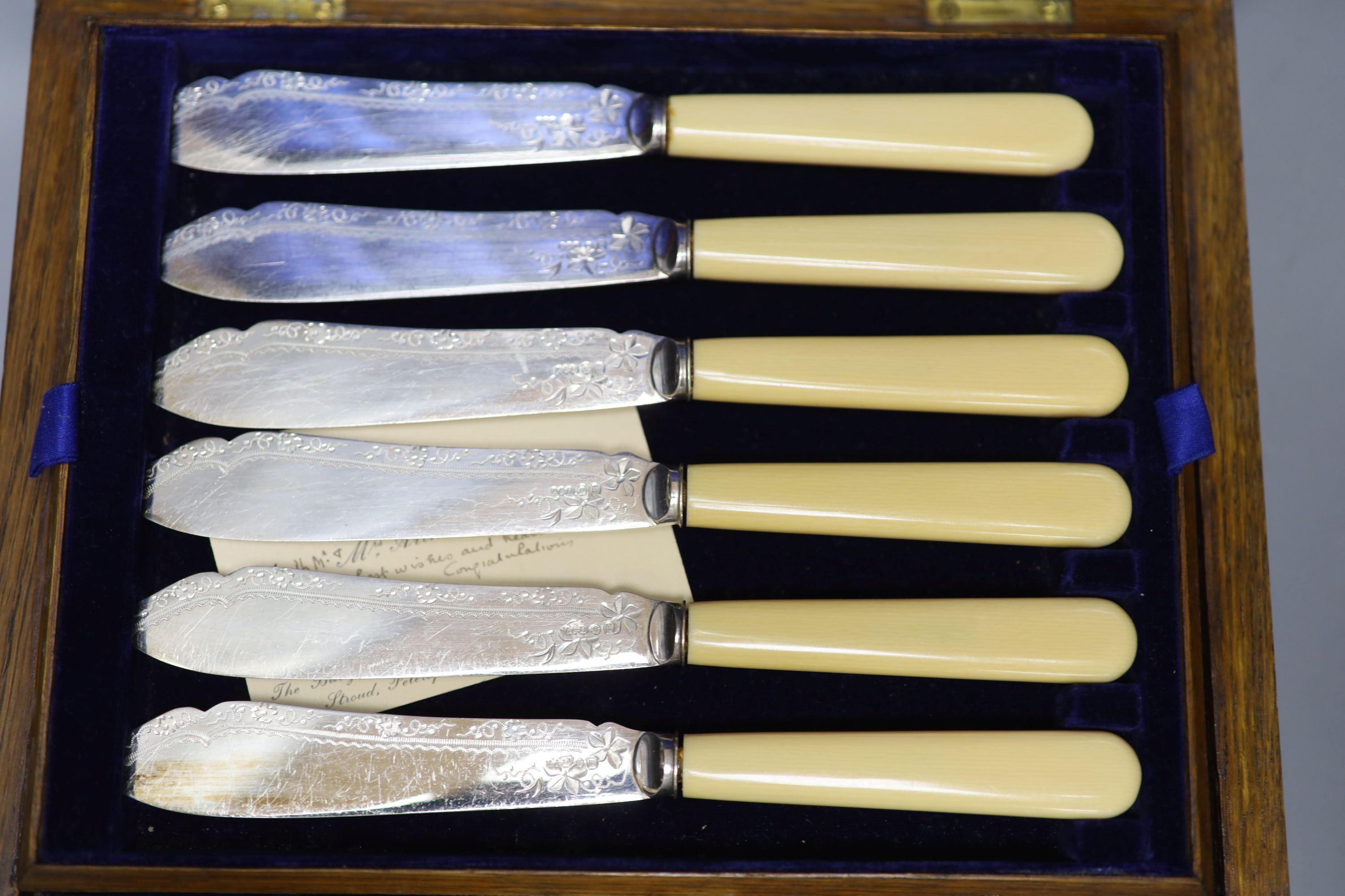 Four cased plated sets and a walnut box